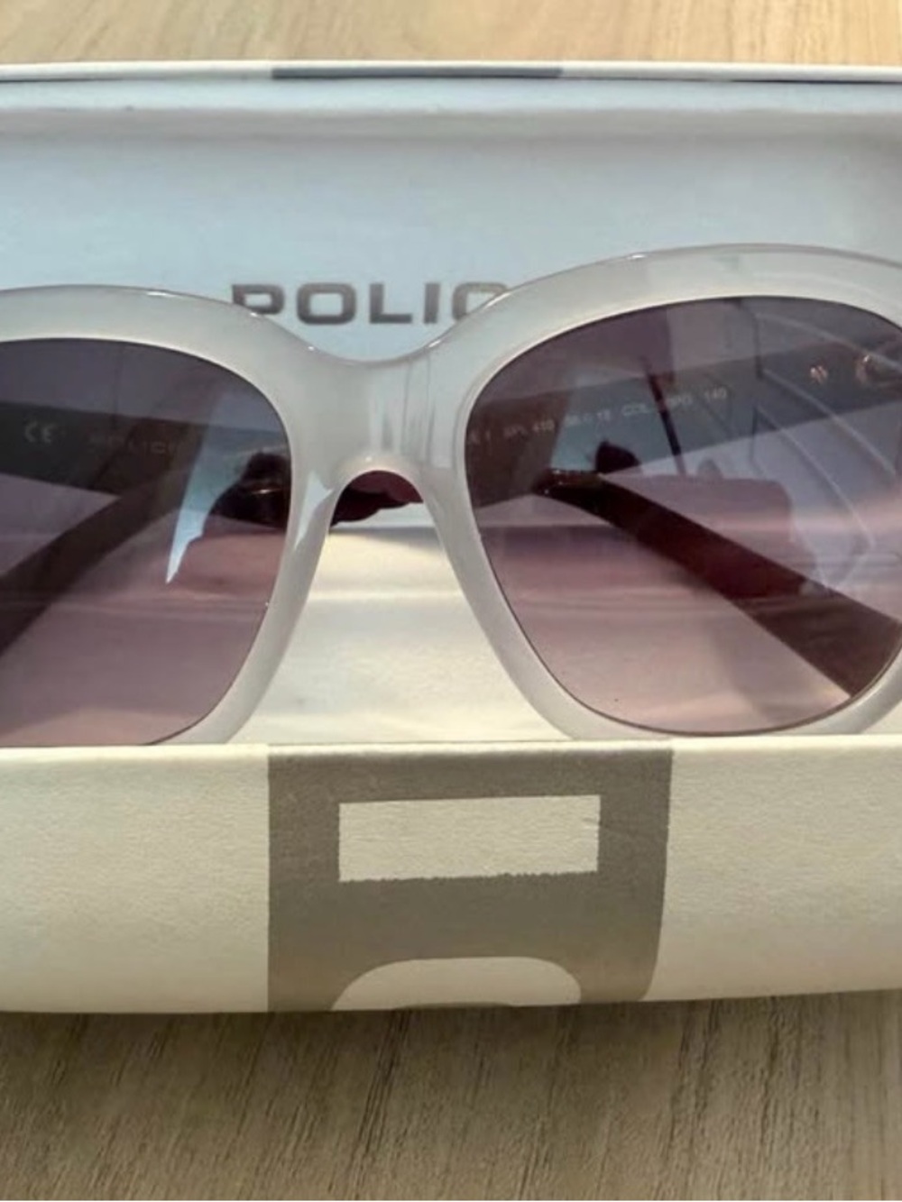 Police Women's White Frame Sunglasses with Pink Gradient Lenses
